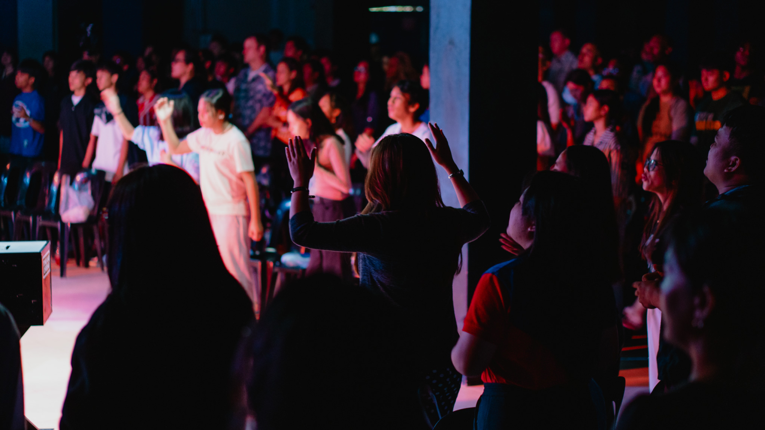 Congregation worshiping during a RockFish Church Philippines gathering