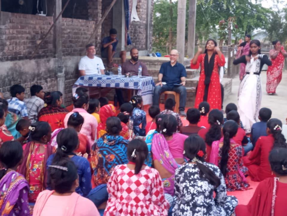 Community Gospel gathering with families seated together